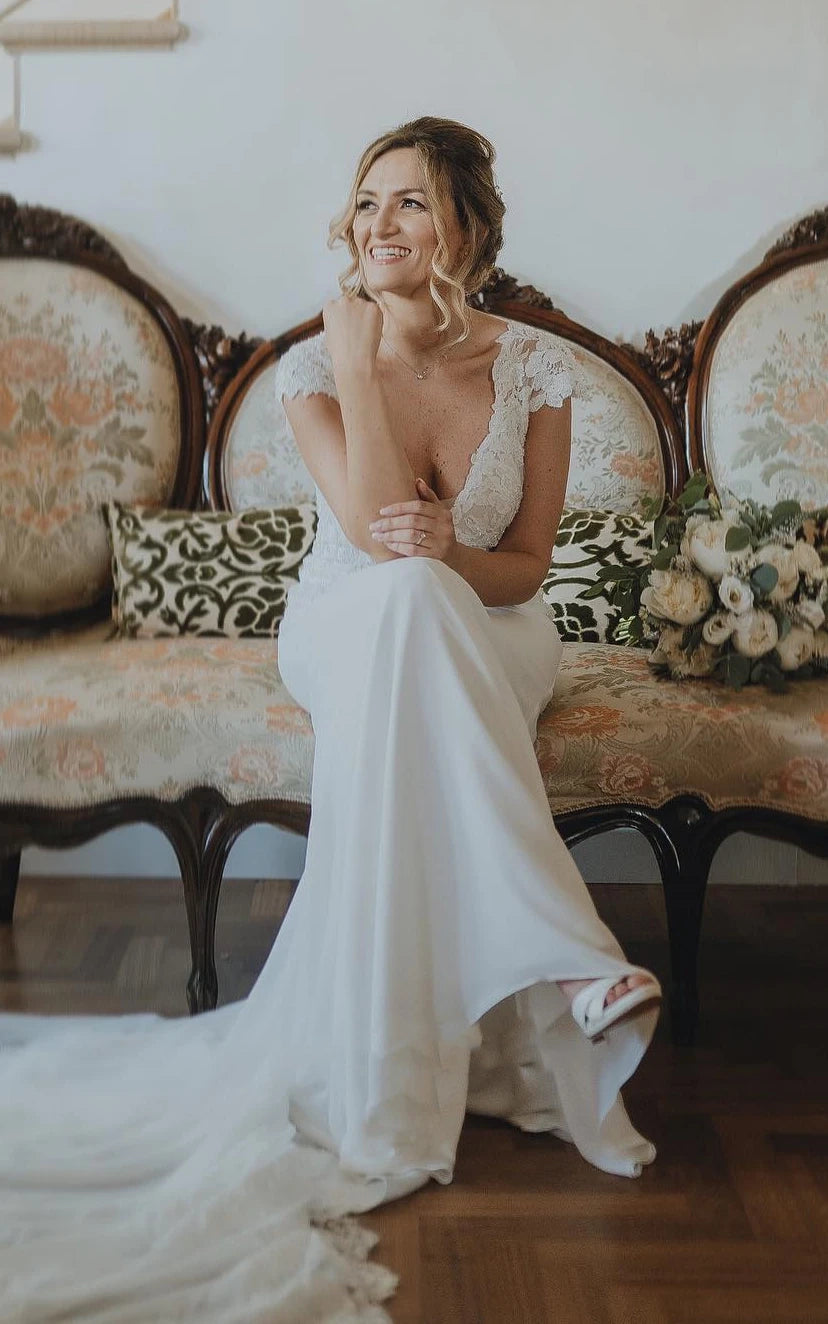 Sheath V-neck Chiffon Modern Wedding Dress With Short Sleeve And Sweep Train