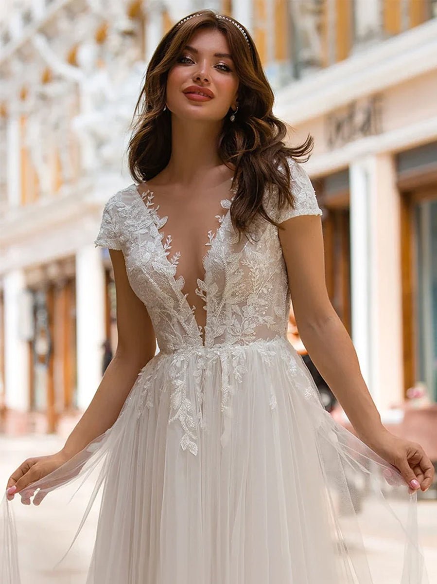 Sexy A Line Plunging Neckline Tulle Sweep Train Wedding Dress with Appliques - KissProm
