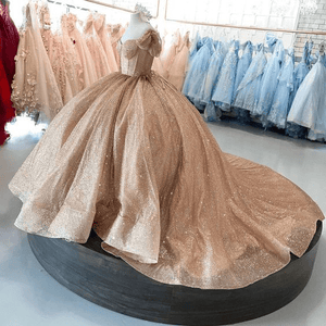 Champagne Sparkle Ball Gown Off-the-Shoulder Short Sleeves Quinceanera Champagne Sparkle Ball Gown Off-the-Shoulder Short Sleeves Quinceanera