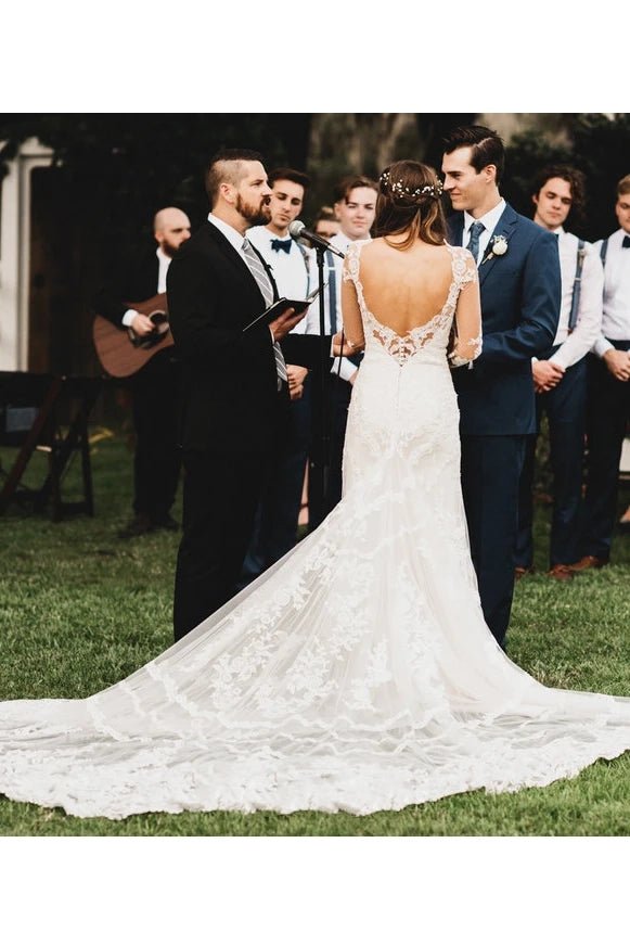 Brilliant Lace Bohemian Deep-V Back Cathedral Train Wedding Dress