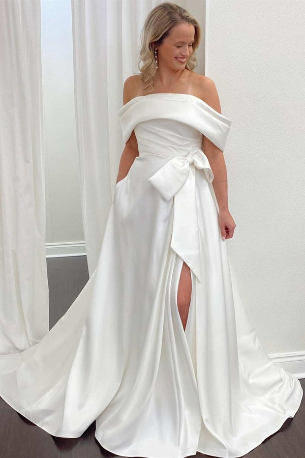 White Satin Off-the-Shoulder Bow A-Line Wedding Dress with Slit – Wedding Dresses by KissProm | Available at KissProm