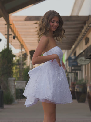 KissProm video of white strapless a-line mini dress for homecoming, showing fit, movement and design details
