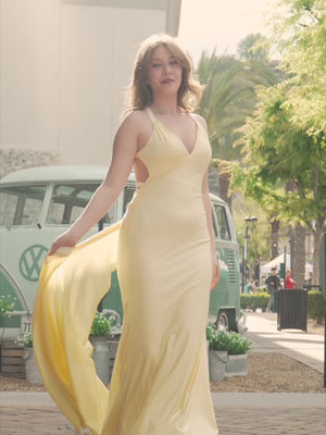 KissProm video of yellow halter mermaid sweep train prom dress, showing fit, movement and design details
