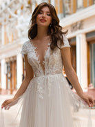 Sexy A Line Plunging Neckline Tulle Sweep Train Wedding Dress with Appliques - KissProm
