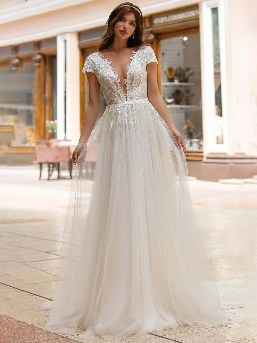 Sexy A Line Plunging Neckline Tulle Sweep Train Wedding Dress with Appliques - KissProm