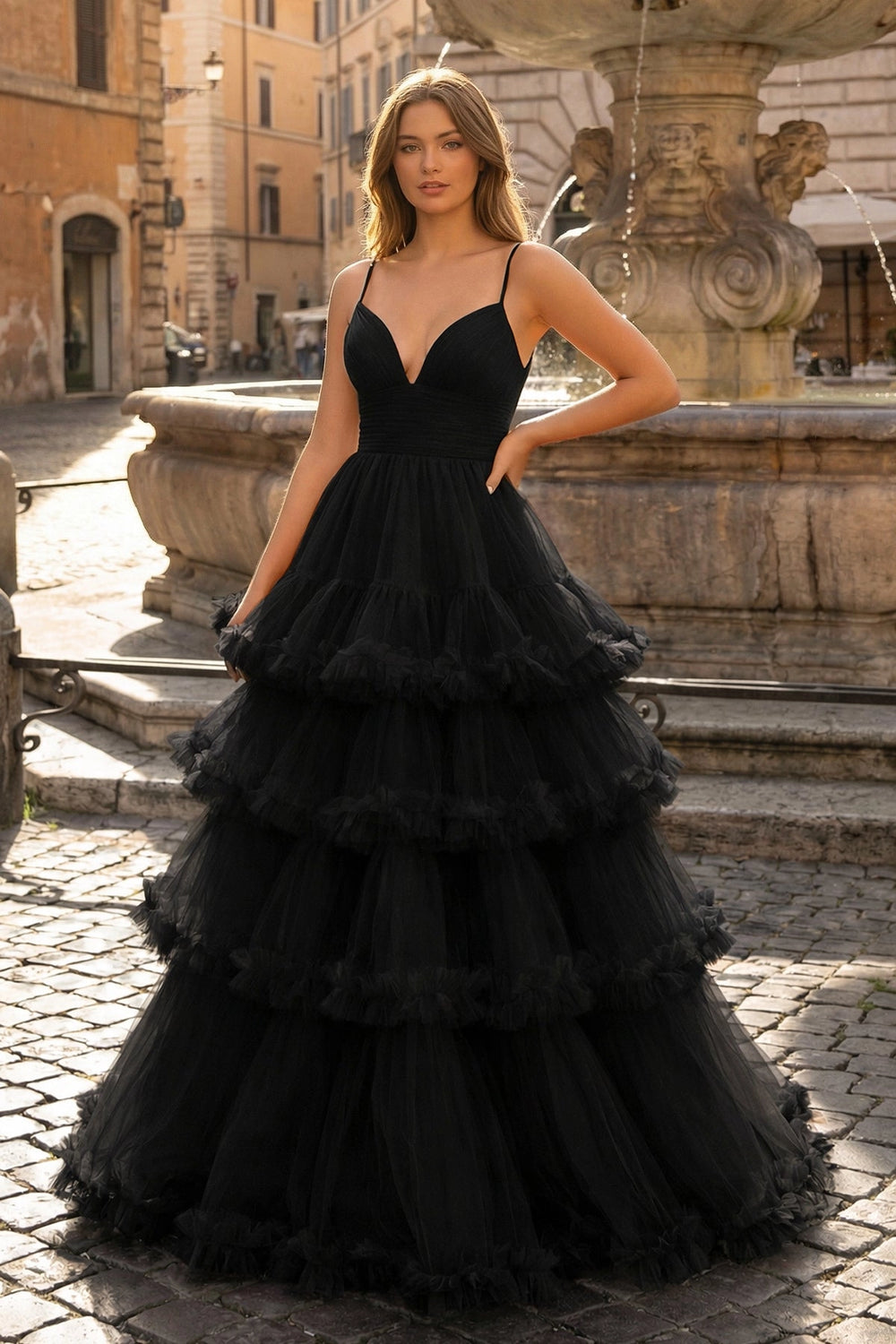 A-line V-Neck tulle prom dress with tiered ruffles in black.